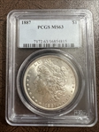 1887 $1 MS63