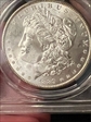 1889 $1 MS64