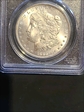 1885 $1 MS65