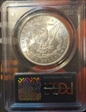 1887 $1 MS64
