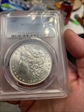 1887 $1 MS64