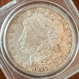 1879 $1 AU-58