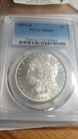 1890-O $1 MS64+ 