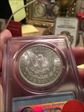 1897 $1 MS64