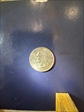  25 cents, a quater    2003 -P AU-58 