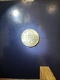 today, 10/1/25 25 cents, a quater 2003-P AU-58 