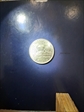 today, 10/1/25 25 cents, a quater 2003-P AU-58 