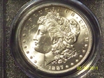 1887 $1 MS63