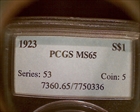 1923 $1 MS65
