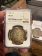 1887 $1 MS62