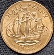 1958 half penny  unc 