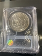 1899 $1 MS64