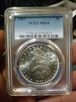 1885 $1 MS64